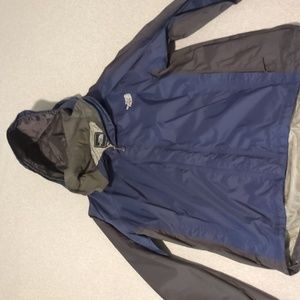 North face rain jacket/ windbreaker.  Not as super waterproof as modern raingear